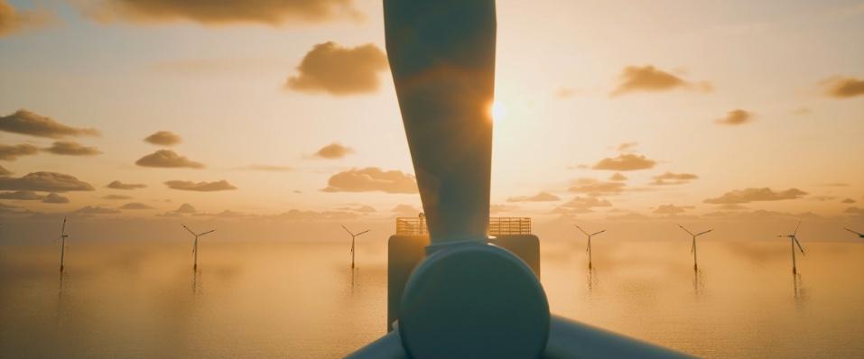Offshore wind turbines at sunset
